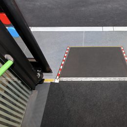 Retractable ramp for wheelchair
