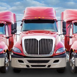 Three red trucks